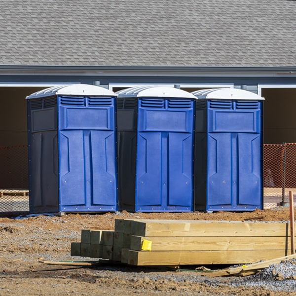 what is the cost difference between standard and deluxe porta potty rentals in Norma